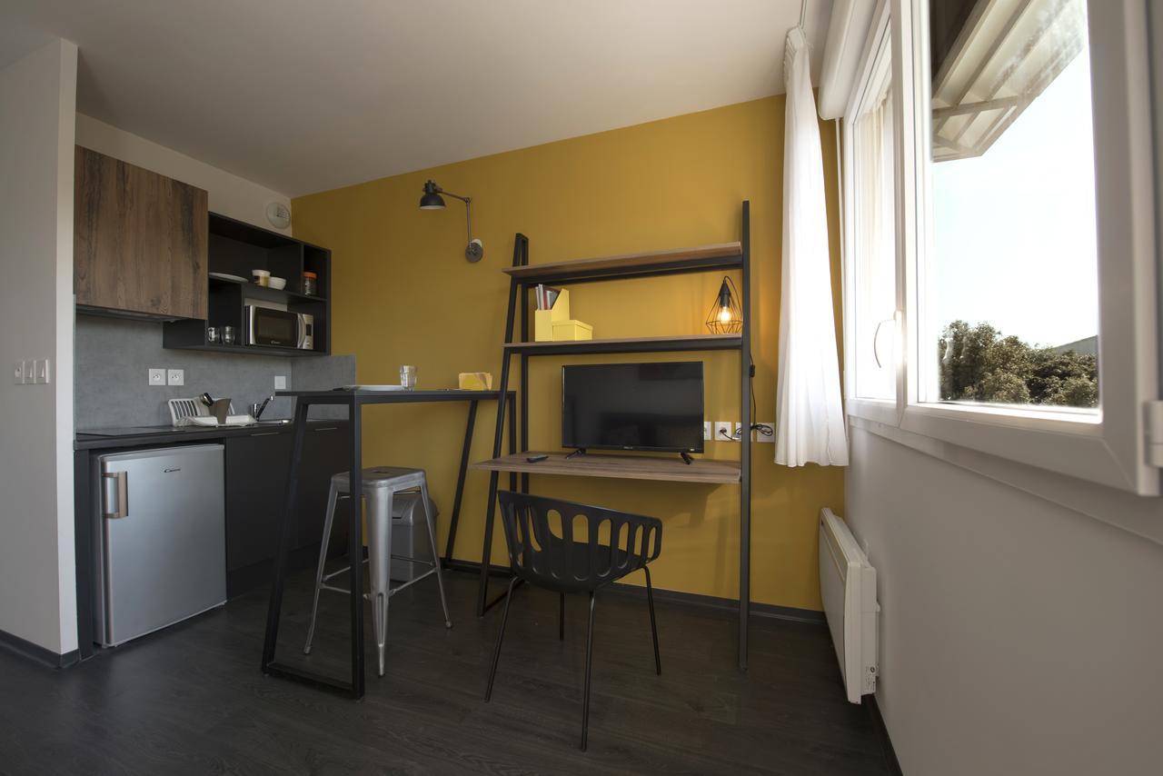 Residence Uxco Kampus 30 Ex Suiteasy Ним Экстерьер фото